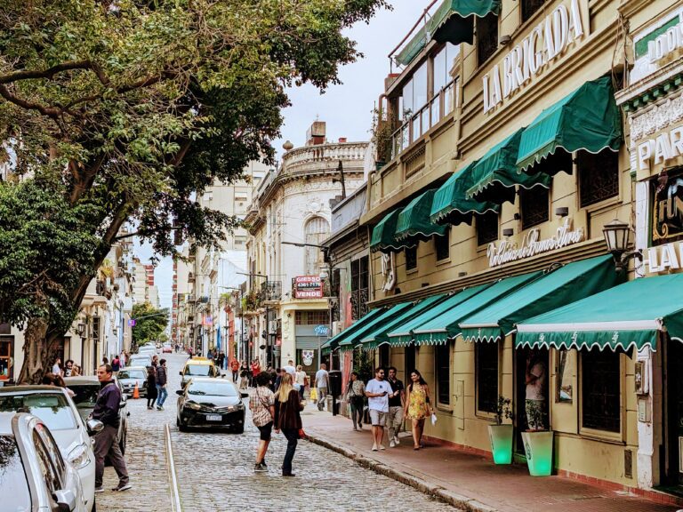 Street in San Telmo, Buenos Aires with shops under green awnings