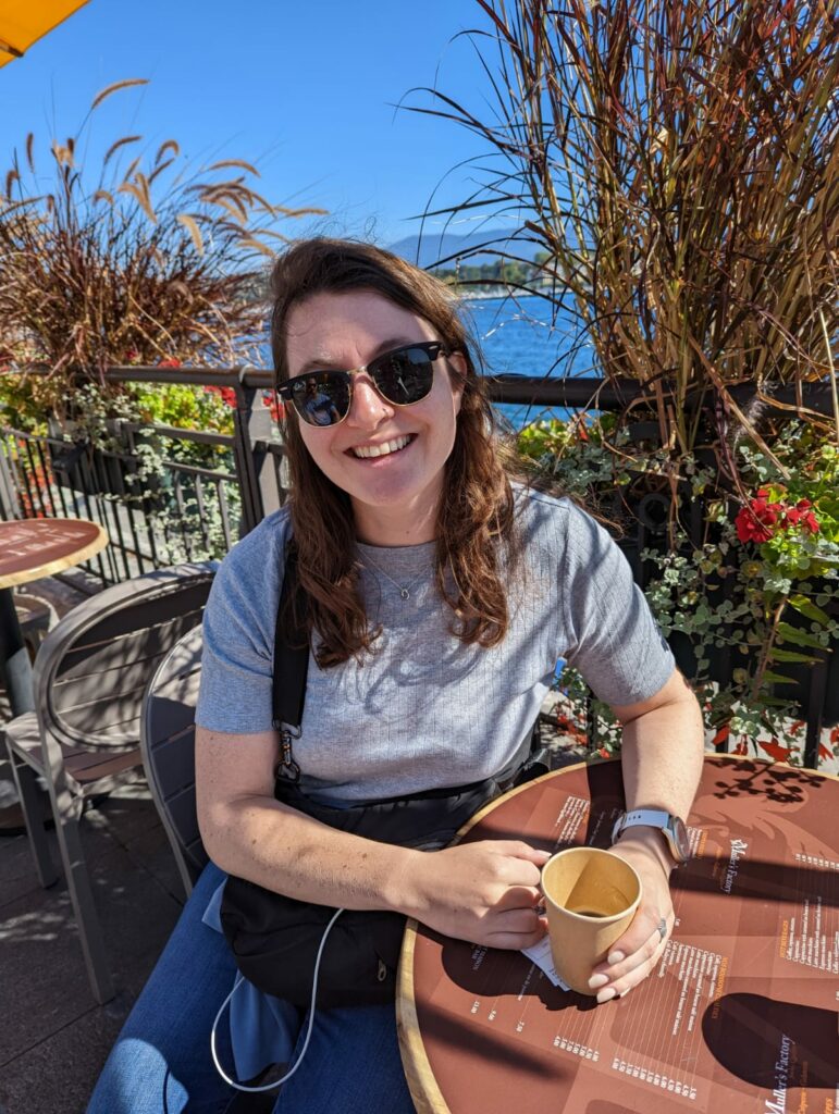 Girl in sunglasses drinking a coffee in Geneva Switzerland