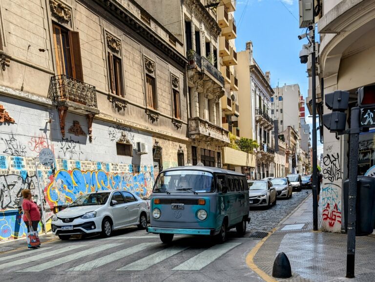 Colorful street in San Telmo, Buenos Aires with a car.
