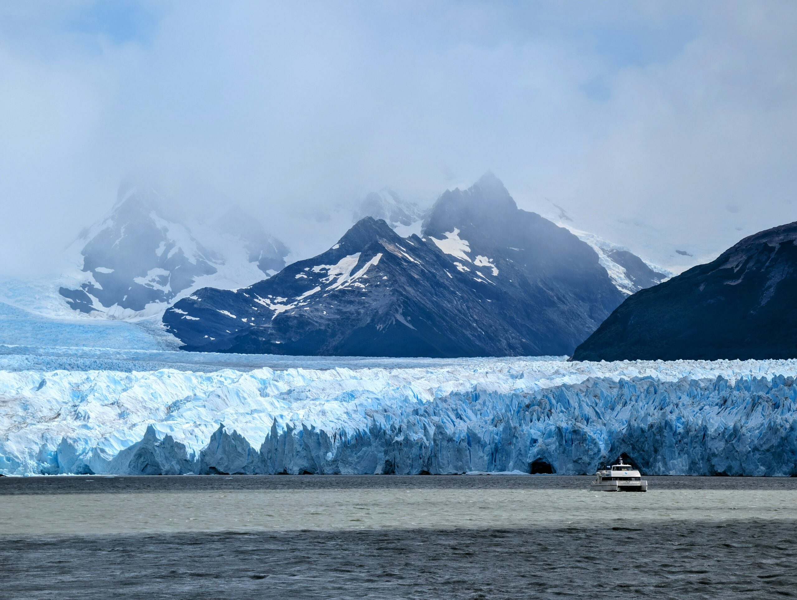 Boat in front of the Perito Moreno Glacier in Southern Patagonia, Argentina