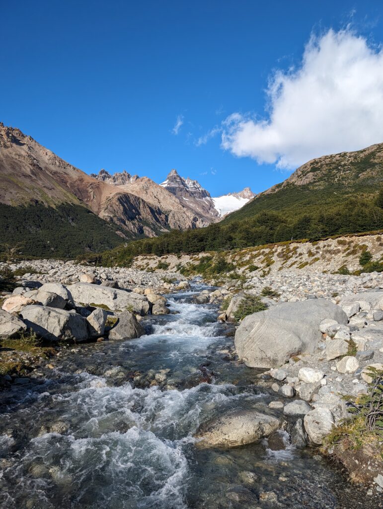 A small river flowing between mountains