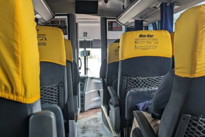 Yellow and grey bus seats - bus through southern patagonia