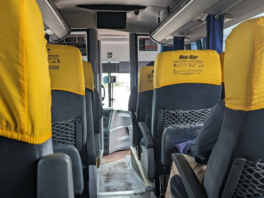 Yellow and grey bus seats - bus through southern patagonia