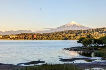 Lake Villarrica with the Villarrica volcano rising behind it in the Chilean Lake District