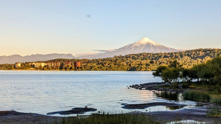 Lake Villarrica with the Villarrica volcano rising behind it in the Chilean Lake District