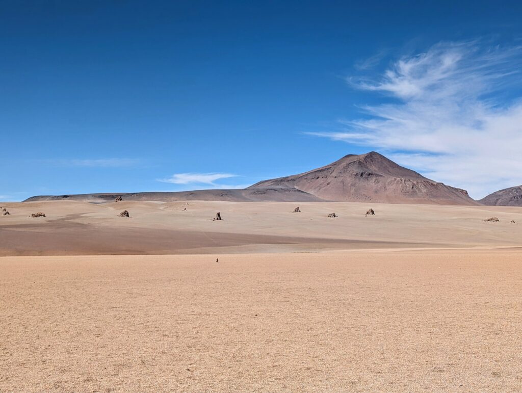 A sand dune in a desert on the Uyuni Salt Flats tour