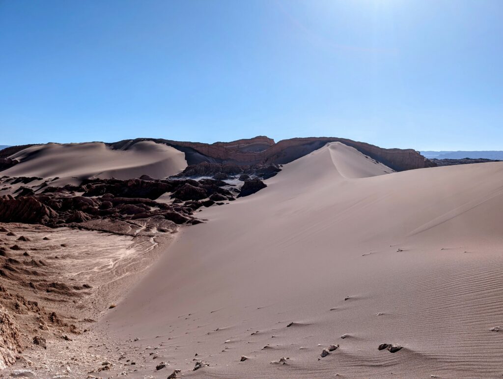 A rocky and sandy landscape outside of San Pedro de Atacama