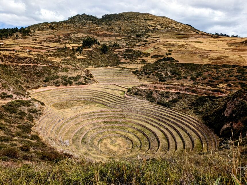 An archaeological site in the Sacred Valley known for its farming tiers in a circular formation and on the Boleto Turistico Cusco