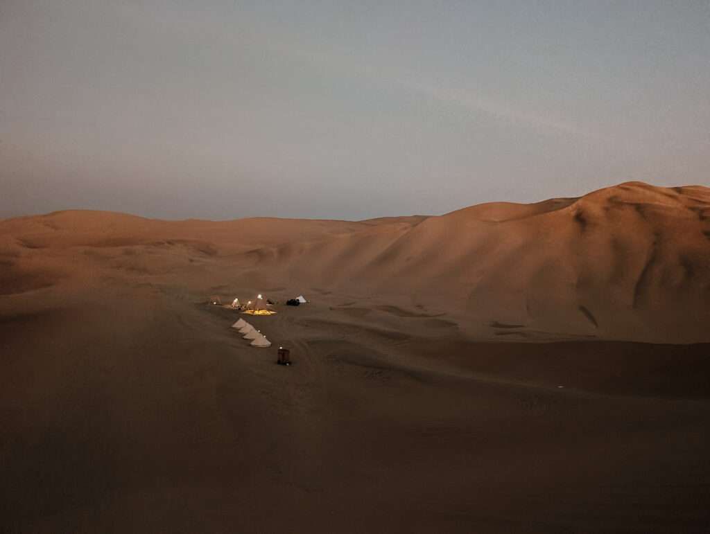 Small tents as part of a glamping experience in the desert outside of Huacachina