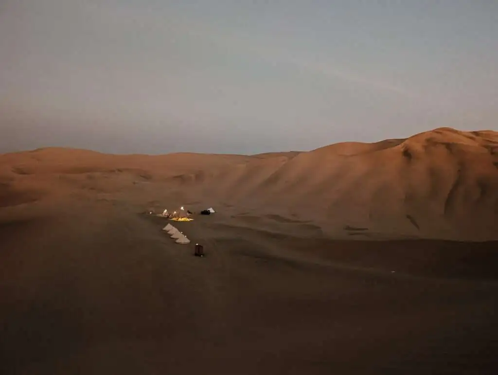 Small tents as part of a glamping experience in the desert outside of Huacachina