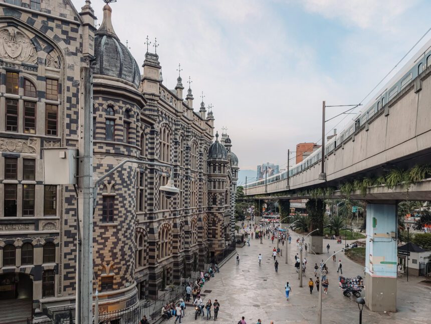 A view of the historic buildings and public tram of Medellin - things to do in Medellin
