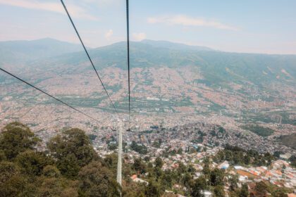 A view over Medellin from the metro cable that connects the mountain areas of the city