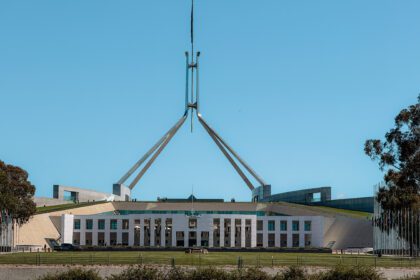A building with a weird antennae or flag pole structure on the ceiling - Canberra itinerary