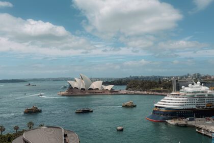 The harbor around the Sydney Opera House including a cruise ship - top things to do in Sydney