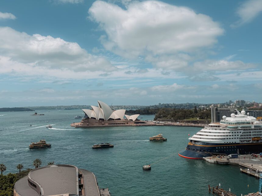 The harbor around the Sydney Opera House including a cruise ship - top things to do in Sydney