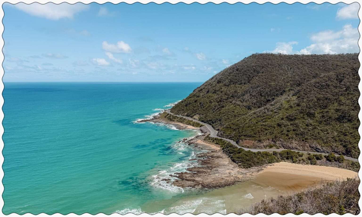 Overlooking a coastal road while driving the Great Ocean Road