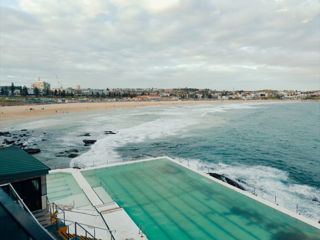 Overlooking a seaside pool next to a beach in Sydney, Australia