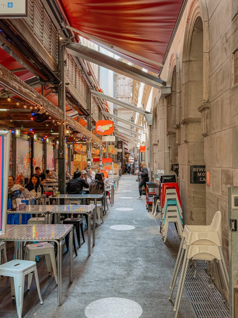 An alley full of restaurants, one of the things that answers the question is Melbourne worth visiting