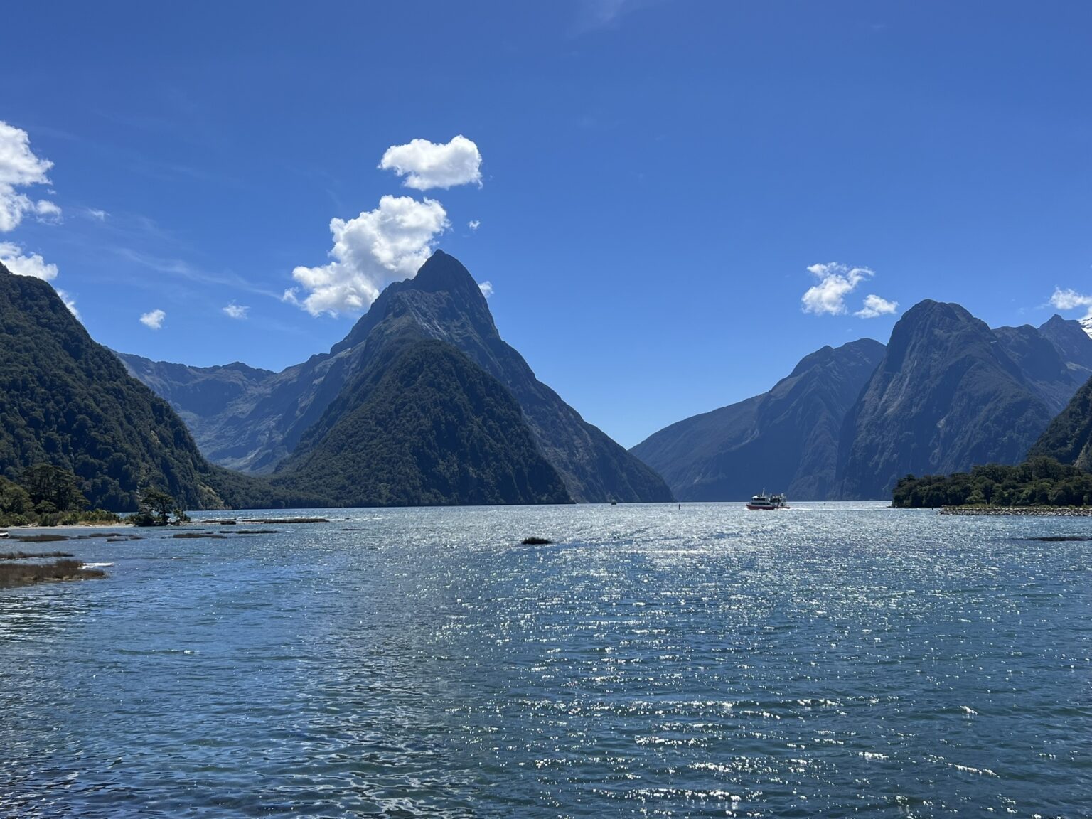 Pointy mountains over a lake in Milford Sound