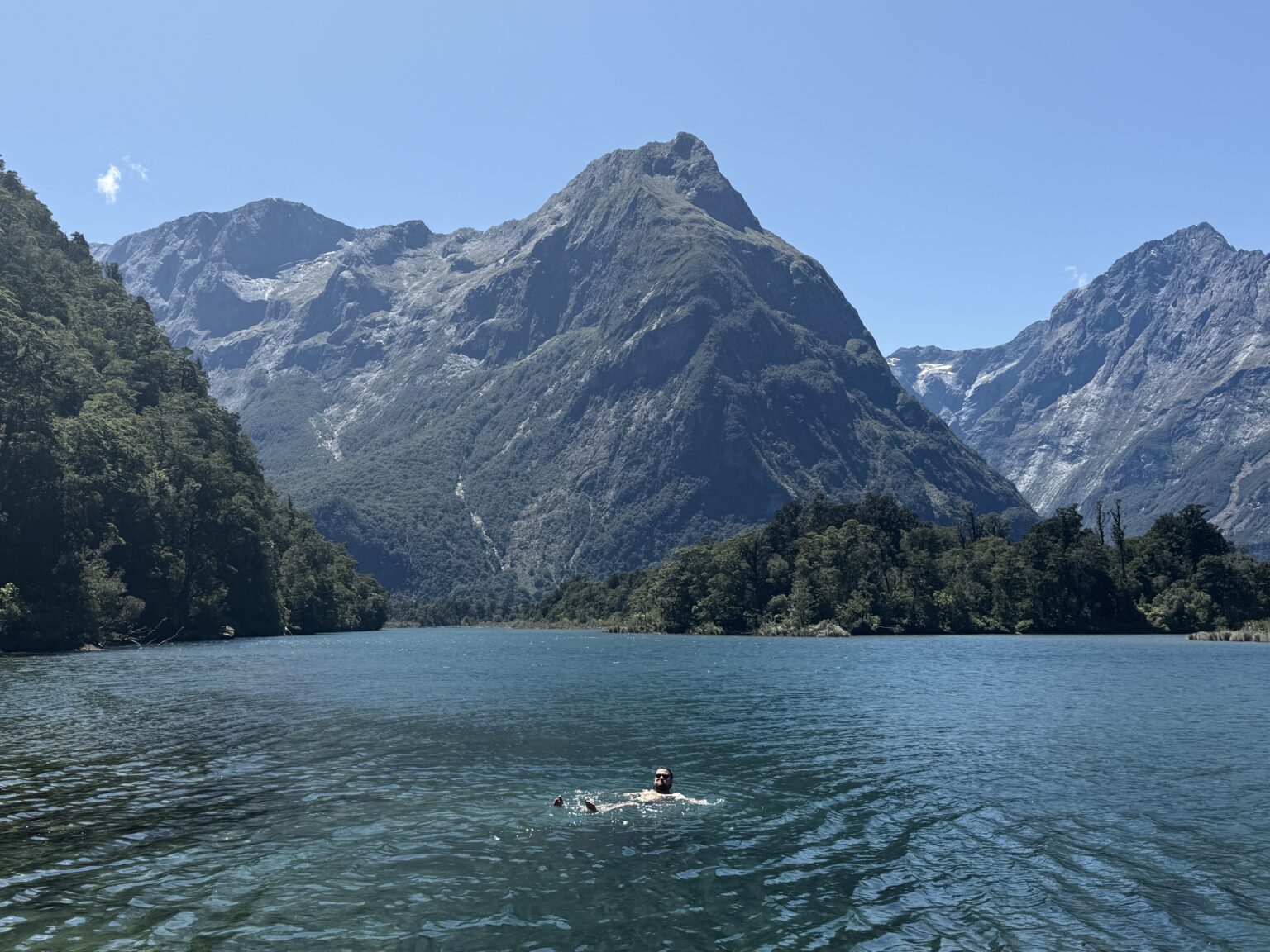 Pointy mountains over a lake in Milford Sound