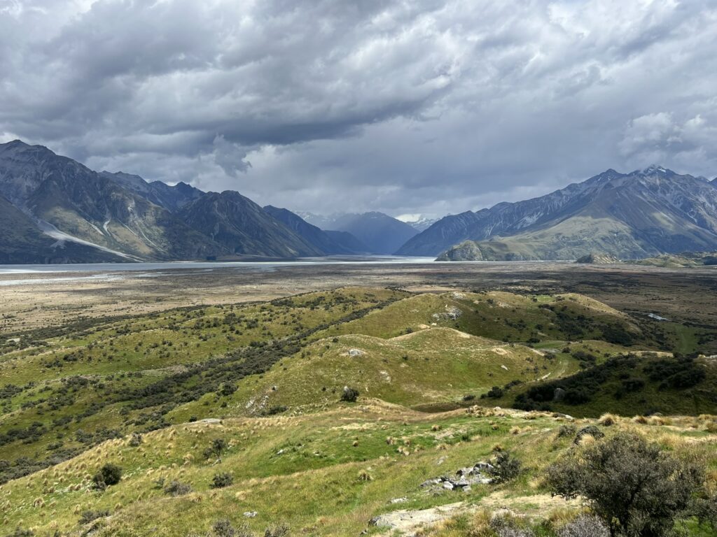 Overlooking a valley between mountains on a trip from Christchurch to Dunedin