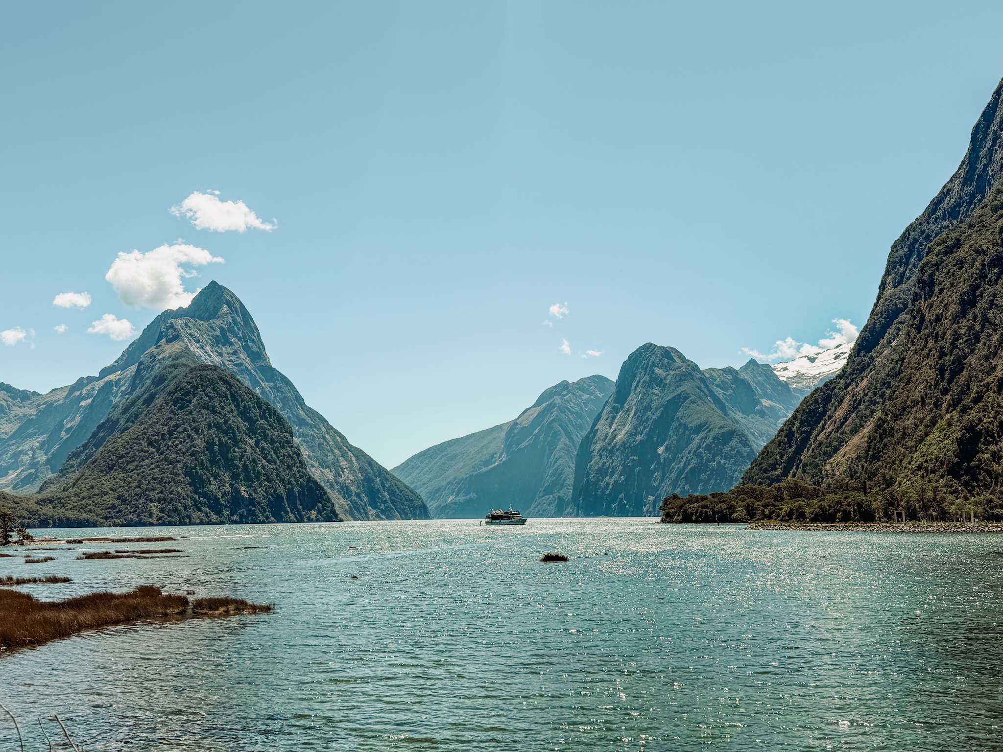 Pointy mountains over a lake - Fiordland National Park Te Anau to Milford Sound