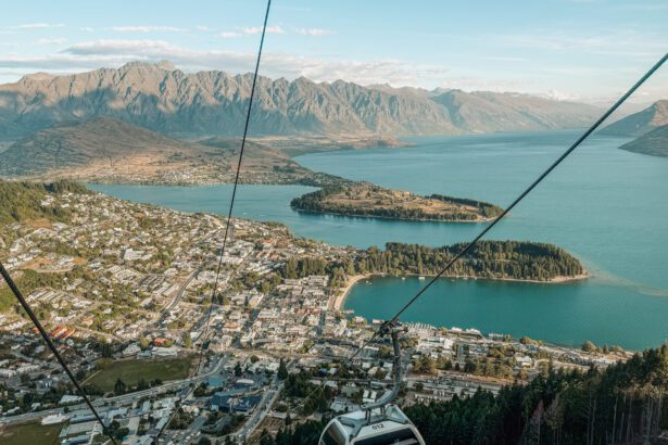 A gondola going over a town that can be done on the itinerary between Queenstown and Christchurch