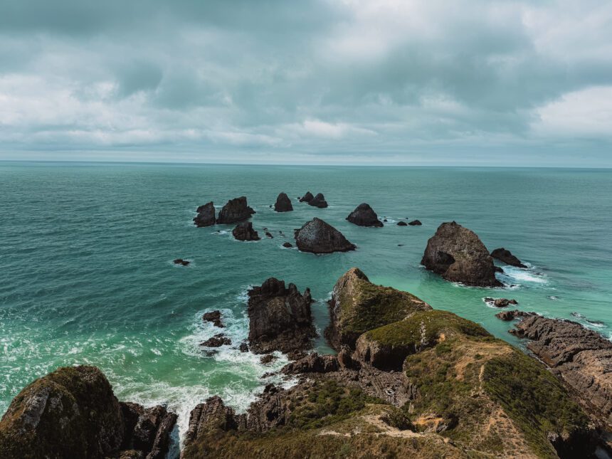 Rocks jutting out of the ocean in the Catlins