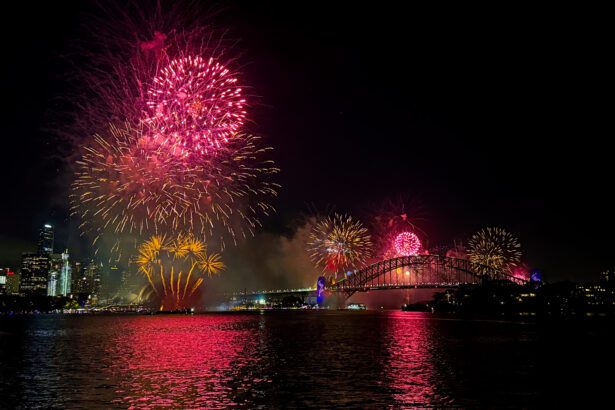 A pink firework show over the city skyline of Sydney for New Year's Eve
