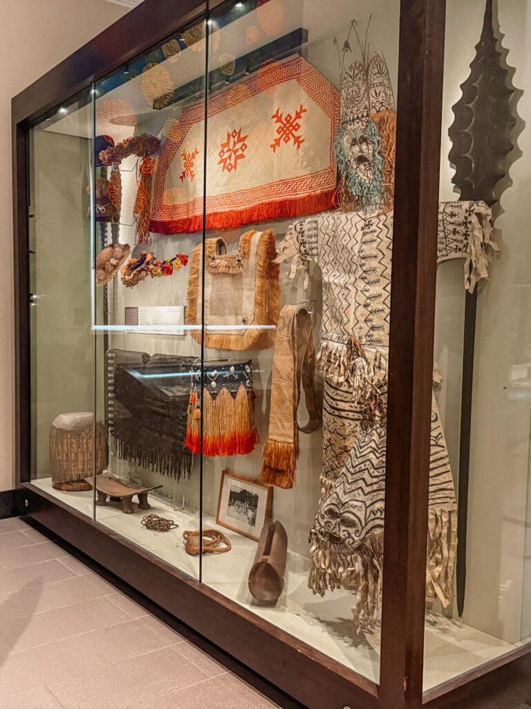 An exhibit of colorful artifacts that were found in the Auckland region