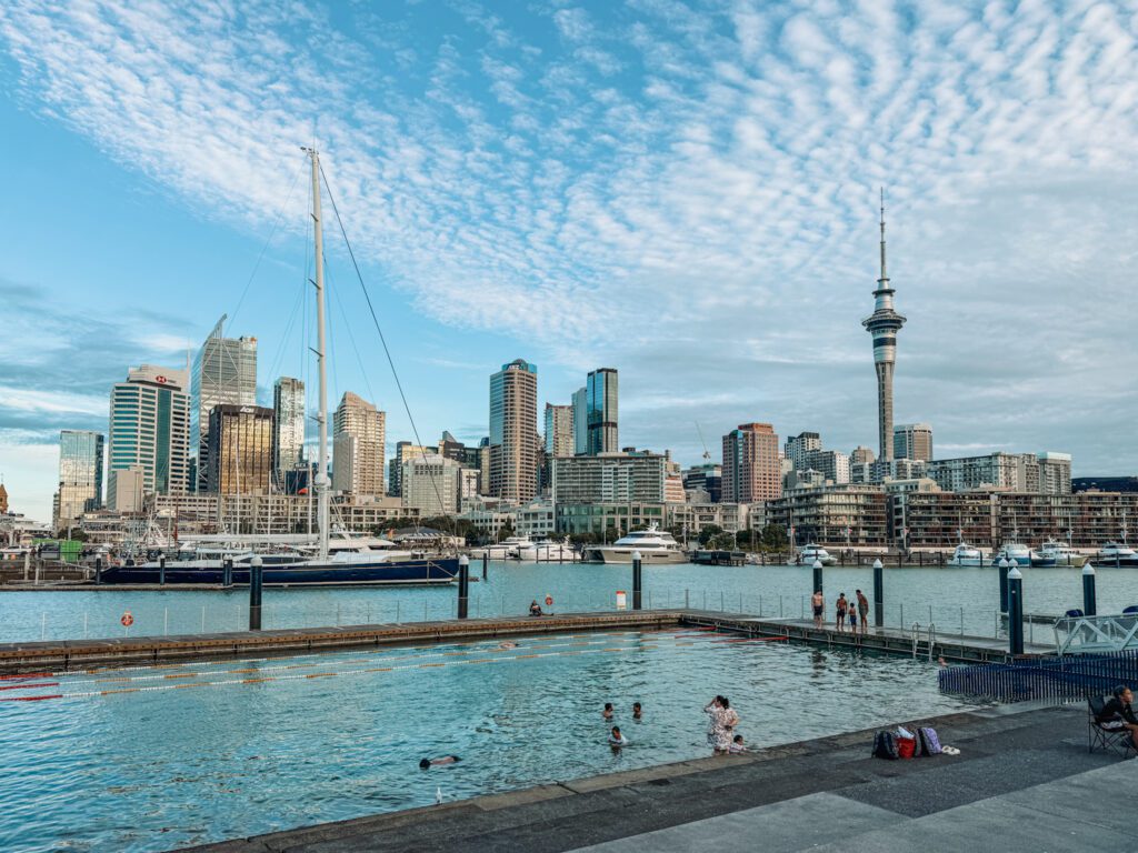 A harbor pool in front of a metropolitan city in Auckland