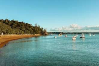 A bay with boats in the harbor of one of things to do in Northland