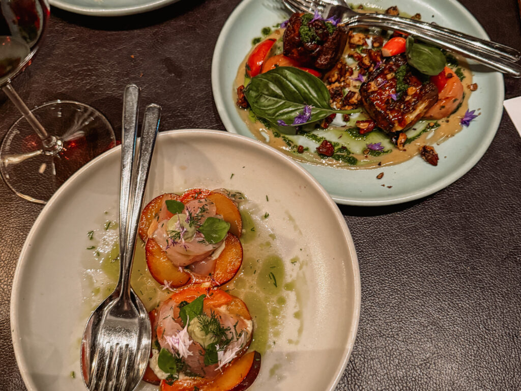 Two dishes of food on a table at a winery in the wine region of New Zealand