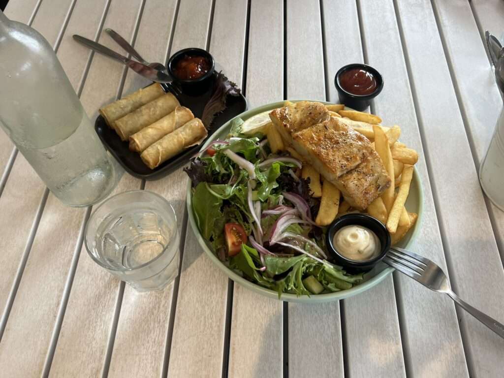 A plate of salad and fish - australia food and drinks