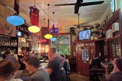 The interior of a pub full of people in one of the best Australia restaurants