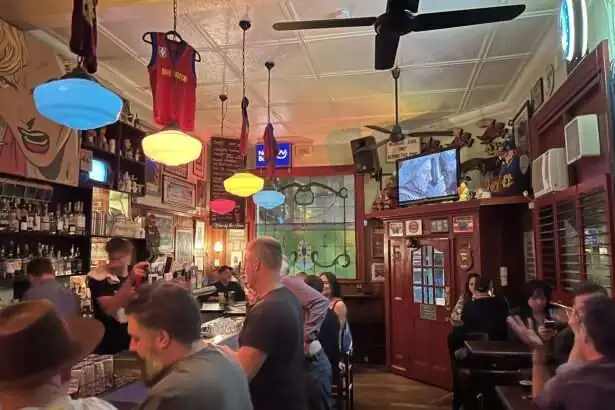 The interior of a pub full of people in one of the best Australia restaurants