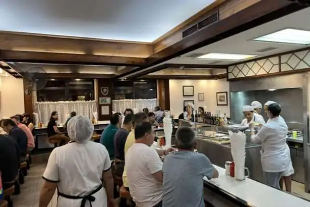 The interior of a busy restaurant - best restaurants in Chile