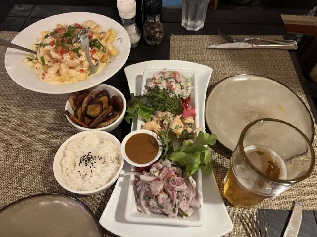 A table full of a variety of ceviche platters - Chile food
