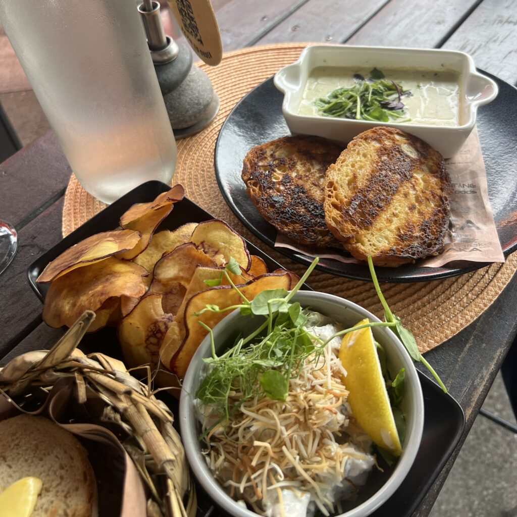 A table with some of New Zealand food and drinks on it