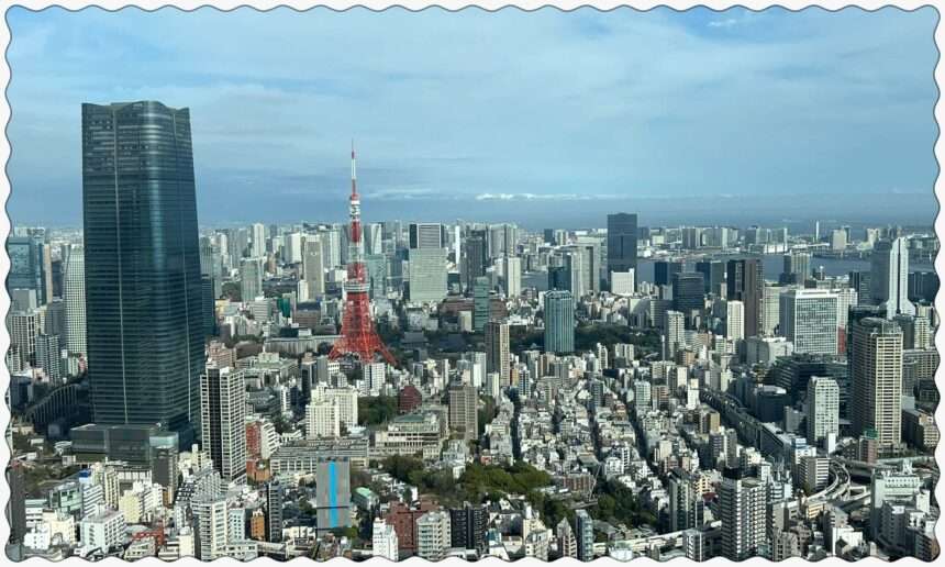 A view of the city of Tokyo, Japan, including the iconic Tokyo tower from an observation tower viewpoint