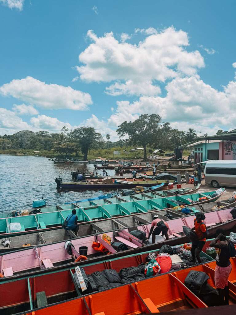 When looking to visit the Guianas, you can do a tour to a maroon community that departs from the boat docks on these colorful pirogues