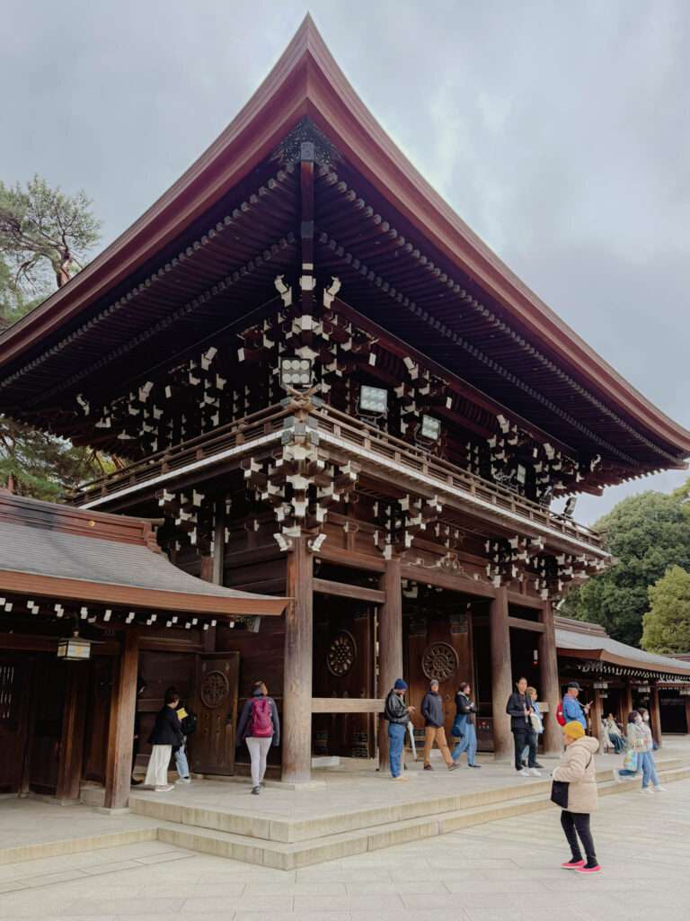 The main wood gate into the temple area of the Meiji temple in Tokyo