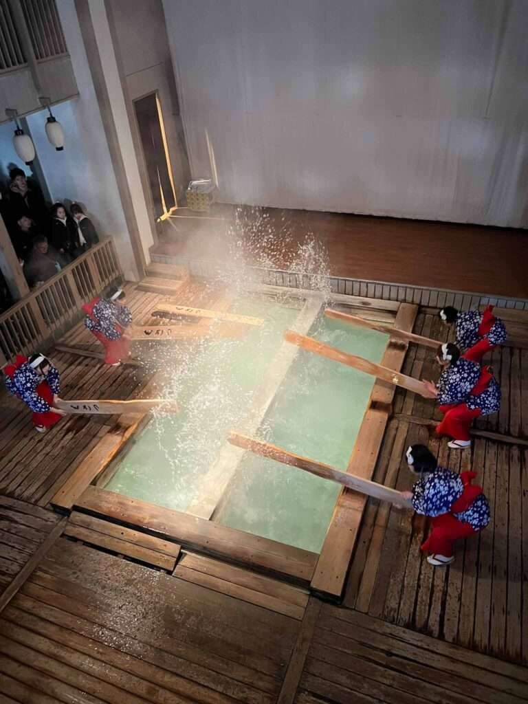 The show of traditional hot spring traditions where women would fan the hot water while singing to cool down the water