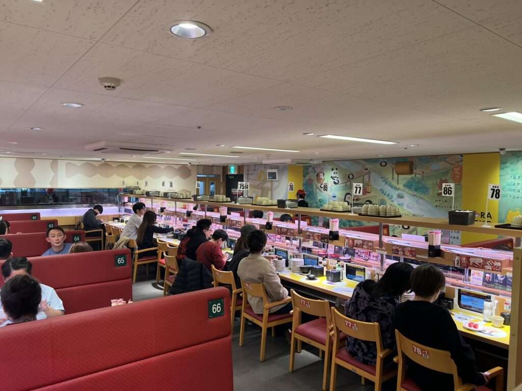 A restaurant with conveyer belt sushi