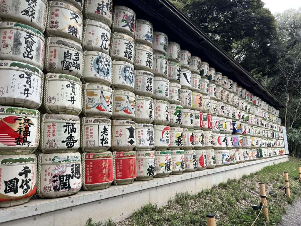 A wall of sake barrels as part of the Meiji temple of Tokyo, Japan