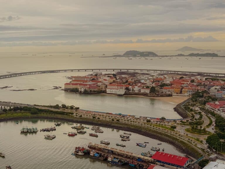 Aerial view of Casco Viejo peninsula, Panama City, with ships queued on the Pacific horizon waiting to enter the Panama Canal