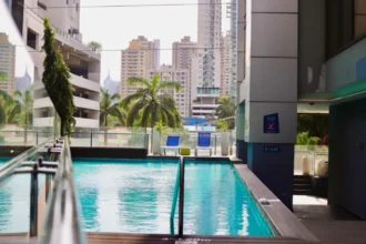 Aloft Panama hotel rooftop pool and bar with Panama City views at night - Aloft Panama City mid-range hotel Punta Pacifica