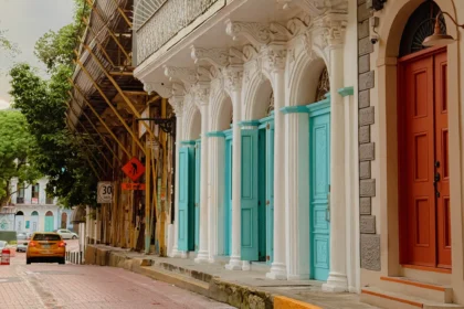 Ornate white colonial facade with teal arched doors in Casco Viejo, Panama City — things to do in Panama City