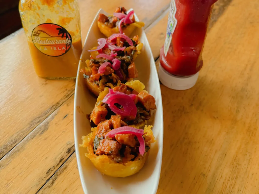 Crispy patacone cups filled with ropa vieja and pickled onions at Restaurante La Isla, Panama - Panama food guide