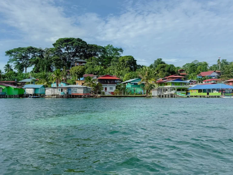 Colorful stilt houses over turquoise water in Old Bank on Isla Bastimentos, Bocas del Toro